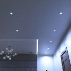 Pack Of 50 6w, Colour Adjustable Fire Rated Downlights, Brushed Chrome -LED Downlights Store full shot of a ceiling with mounted cool white brushed chrome downlights 2