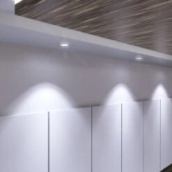 Pack Of 10 Fixed Fire Rated GU10 Downlights With A Polished Chrome Finish -LED Downlights Store medium close up of mounted downlights